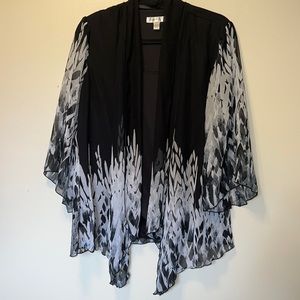 Solid black attached shell under sheer print